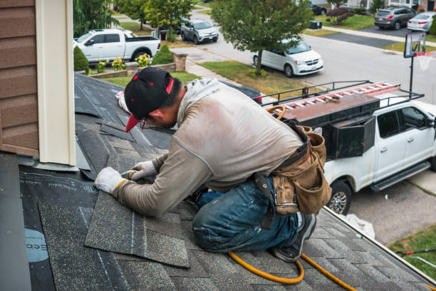 Professional Roof Replacement technician working in Brevard, NC